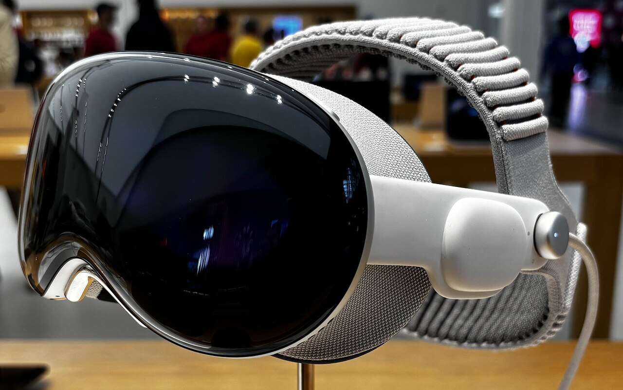 Apple Vision Pro M5 headset for Apple layoffs 2026 news