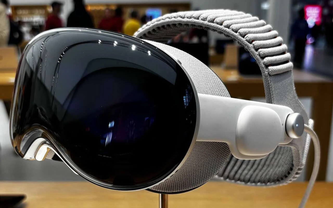 Apple Vision Pro M5 headset for Apple layoffs 2026 news