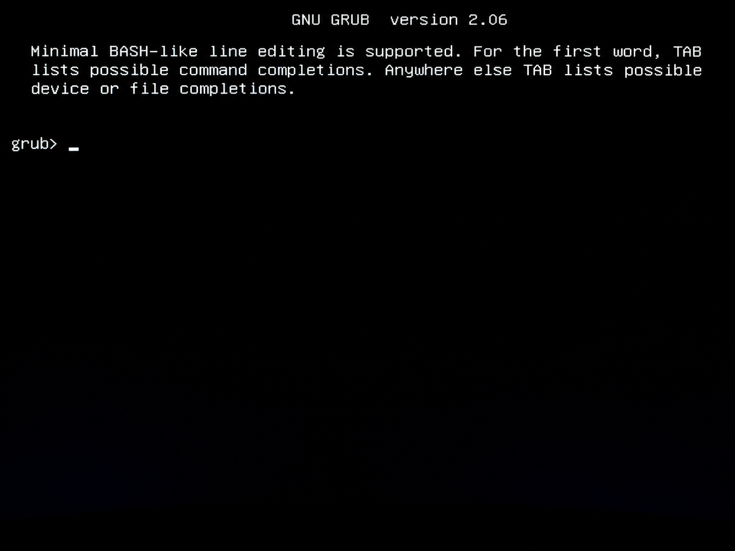 GNU GRUB command line screen showing Minimal BASH-like line editing and grub prompt